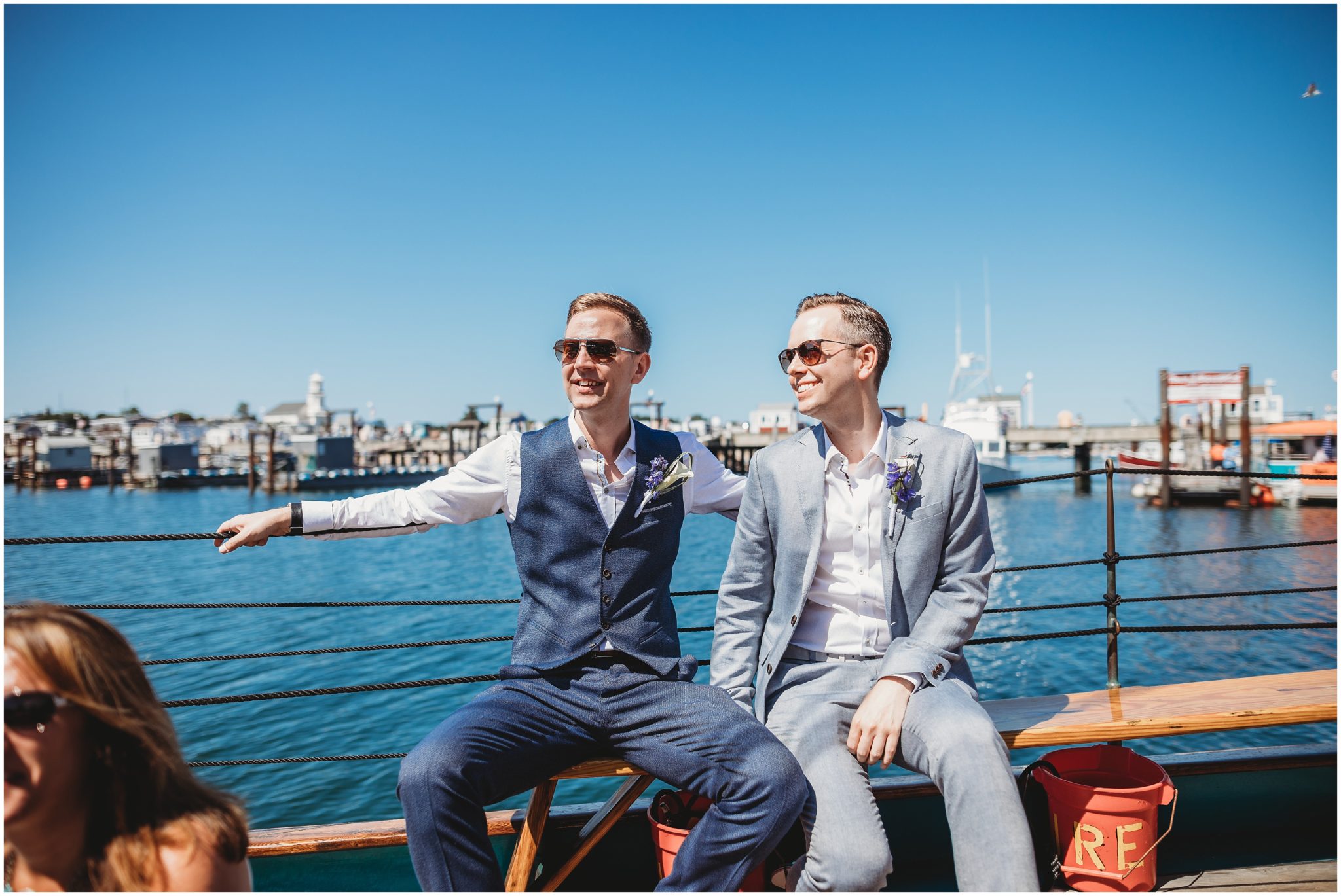 grooms sitting on schooner - boston wedding photography
