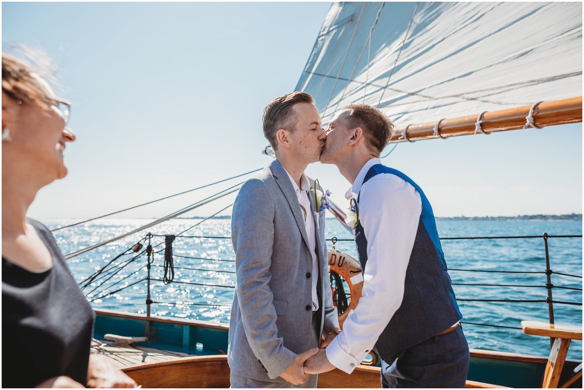 first kiss aboard ship - same sex wedding photographer