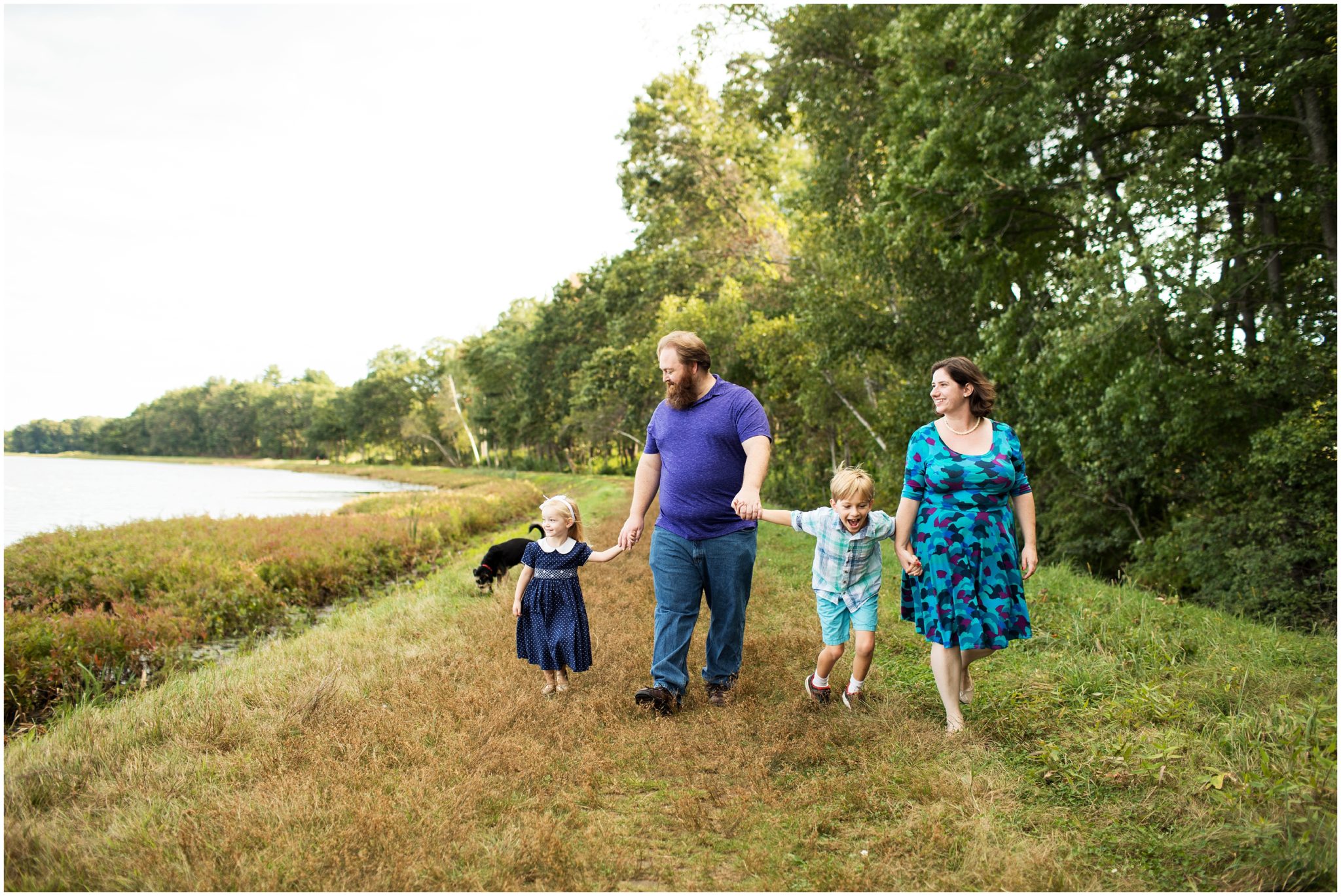 family holding hands by lake - framingham ma photography