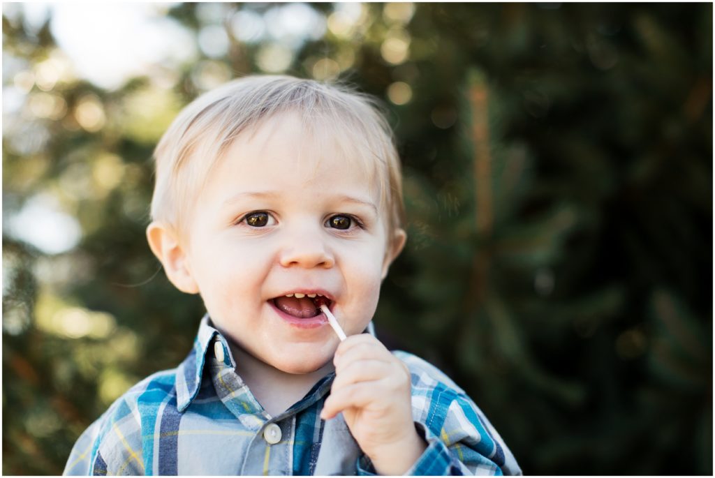 boy smiling with lollipop | ma family photographer