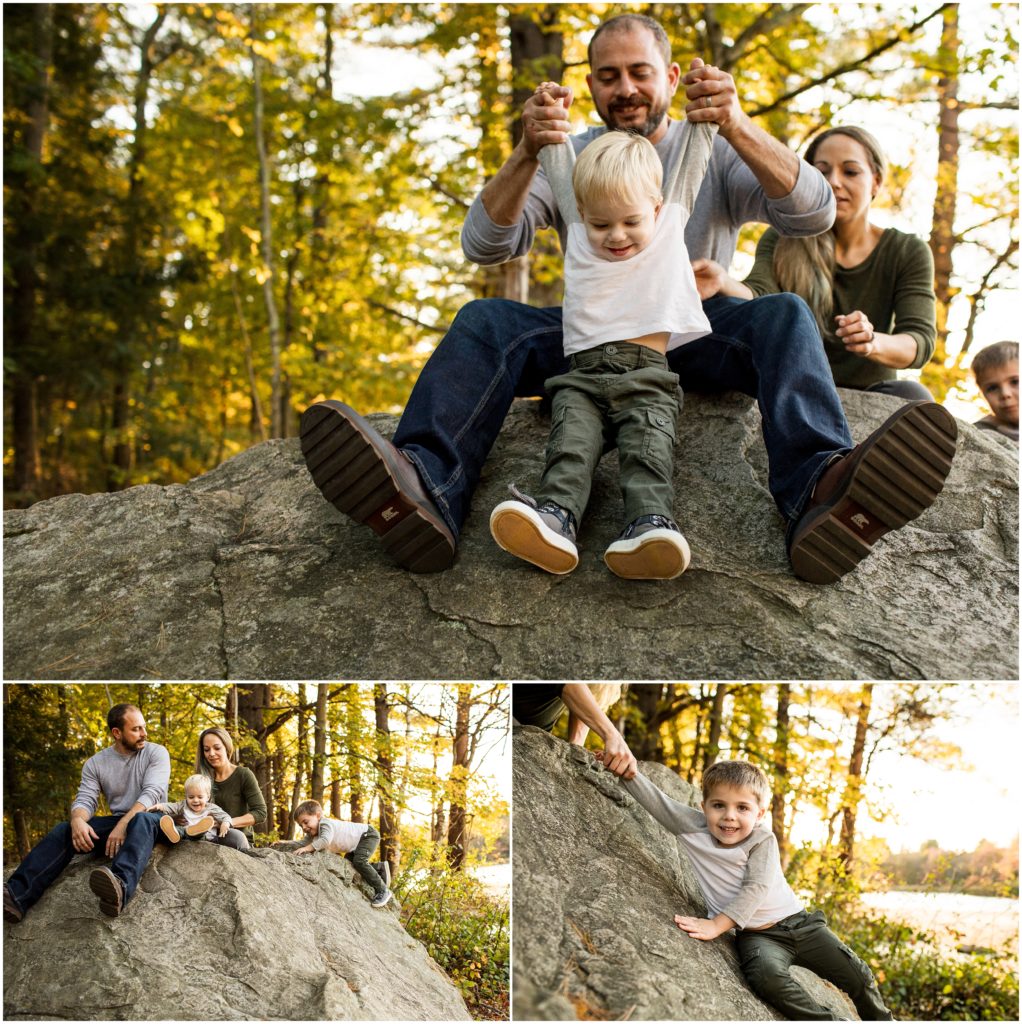 father-dangling-son-off-rock-boston-family-photography