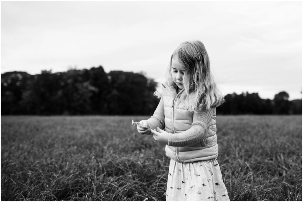 girl-picking-flower-massachusetts-portrait-photographer