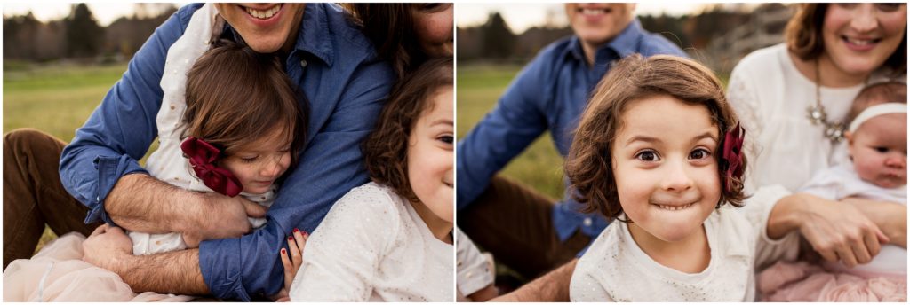 family-snuggling-in-grass-boston-child-photographer