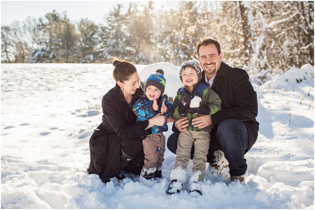 family-laughing-in-snow-massachusetts-family-photographer
