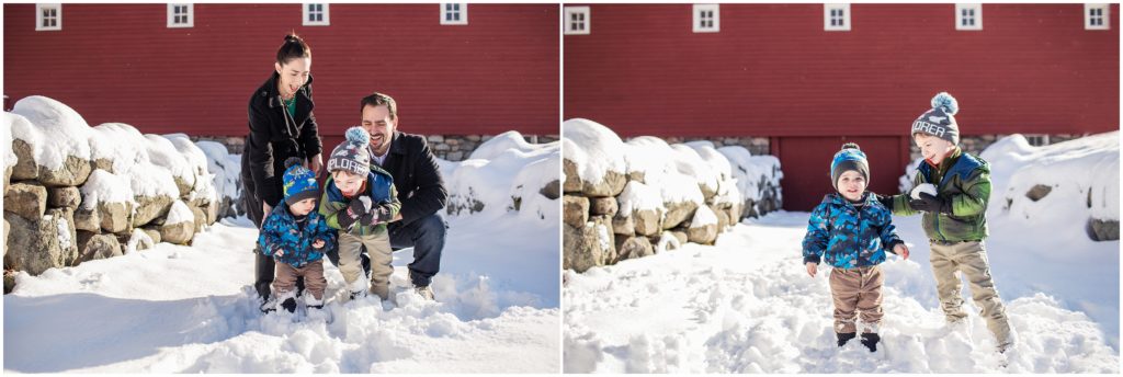 family-by-red-barn-in-snow-boston-child-portraits