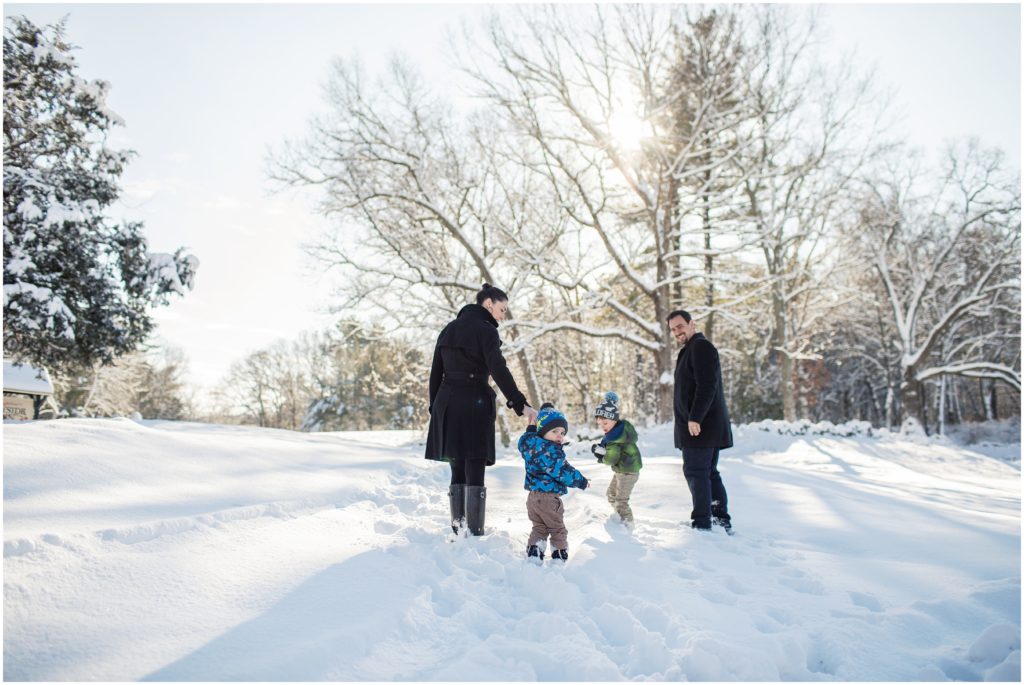 family-walking-in-snow-boston-photographer