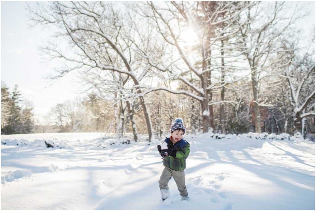boy-with-snowball-boston-family-photography
