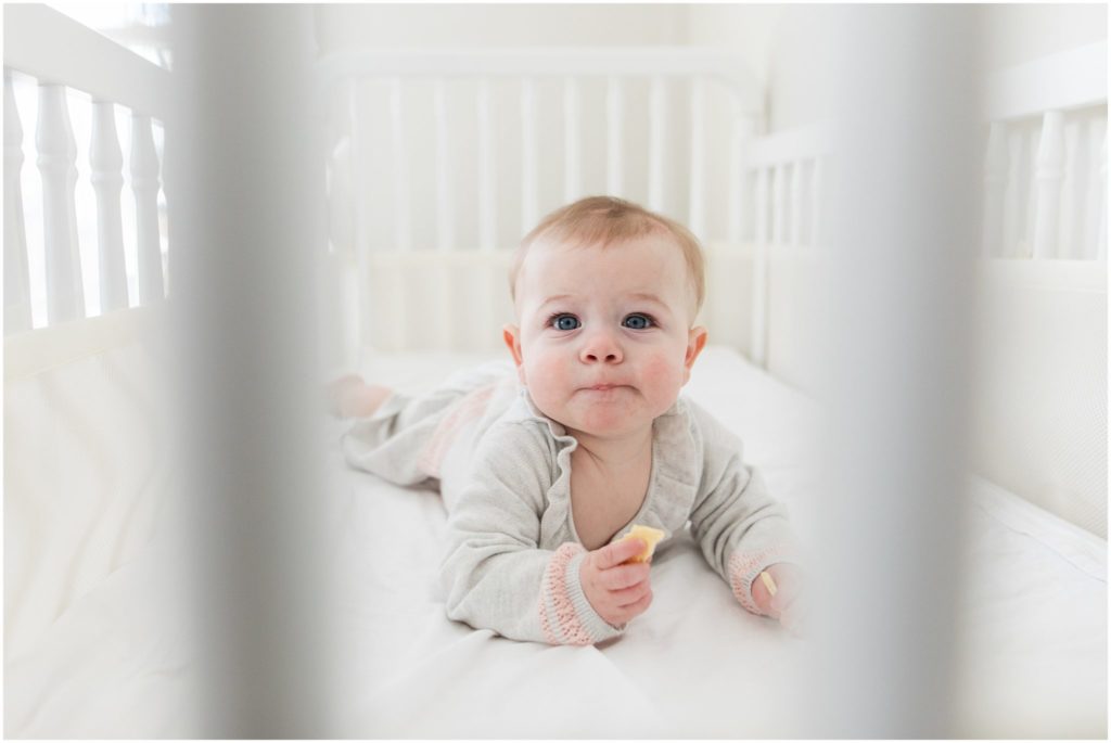 baby-peeking-through-crib