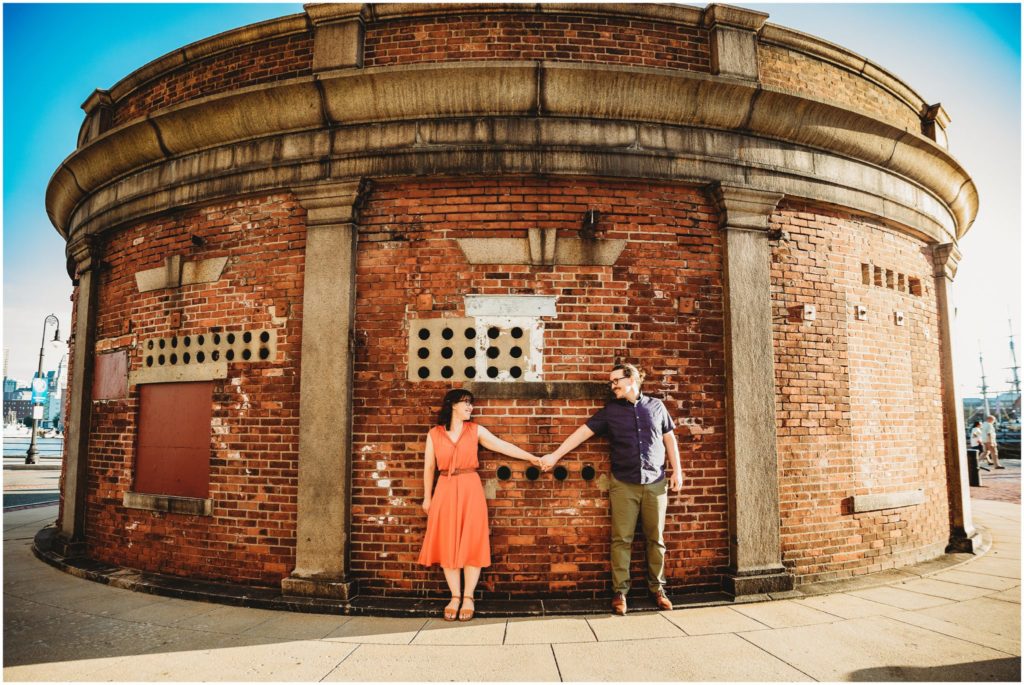 couple-in-front-of-round-building