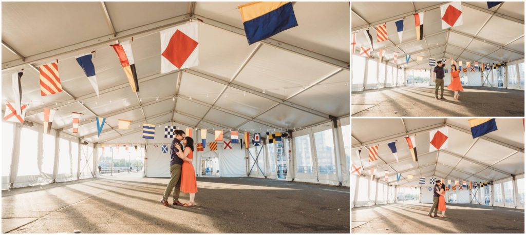 couple-in-white-tent-with-flags