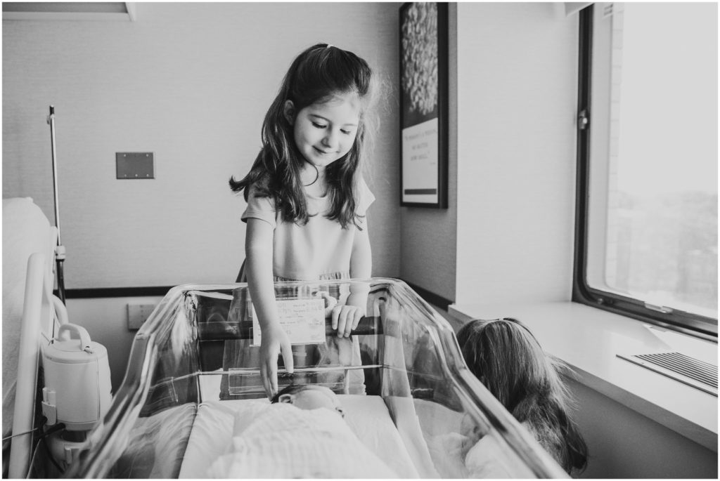 big-sister-touching-baby-boston-newborn-photographer