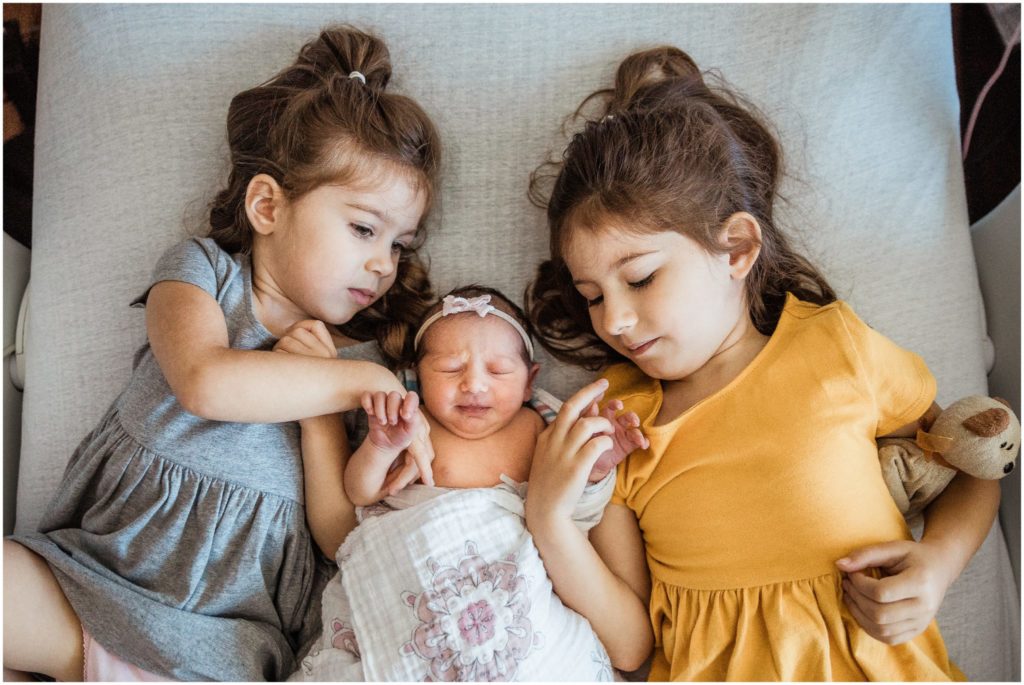 sister-in-hospital-bed-boston-newborn-photographer