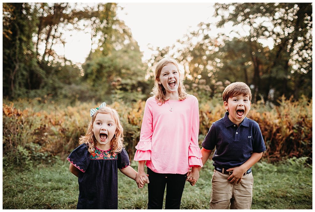 three-kids-yelling-outdoors