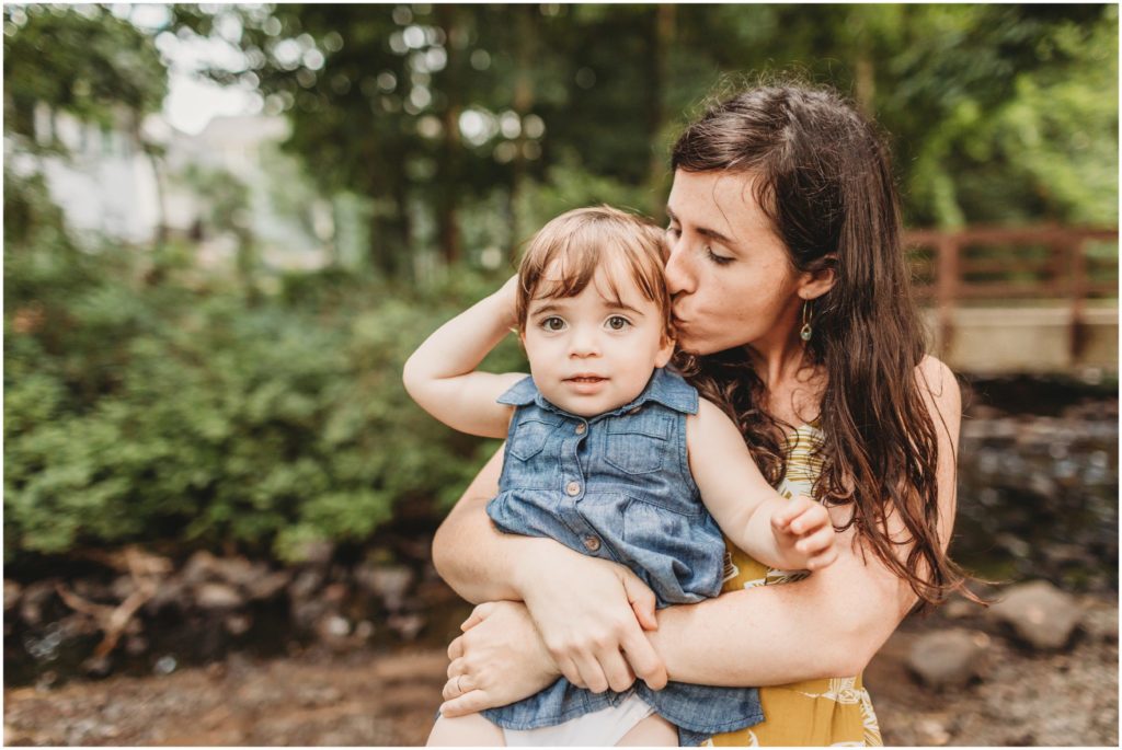 mom-hugging-baby-girl-in-denim-boston-family-photographer