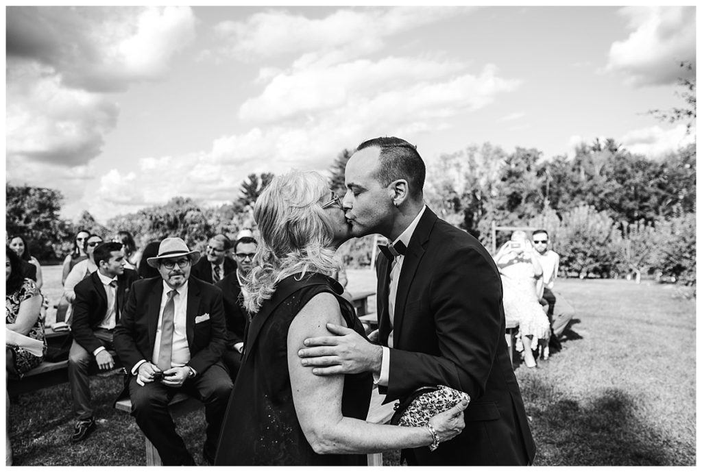 groom-kisses-mother-wedding