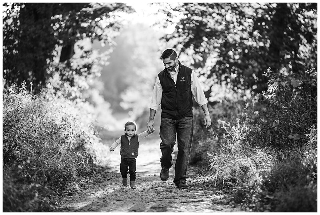 father-and-son-running-outside-black-and-white-boston-family-photographer