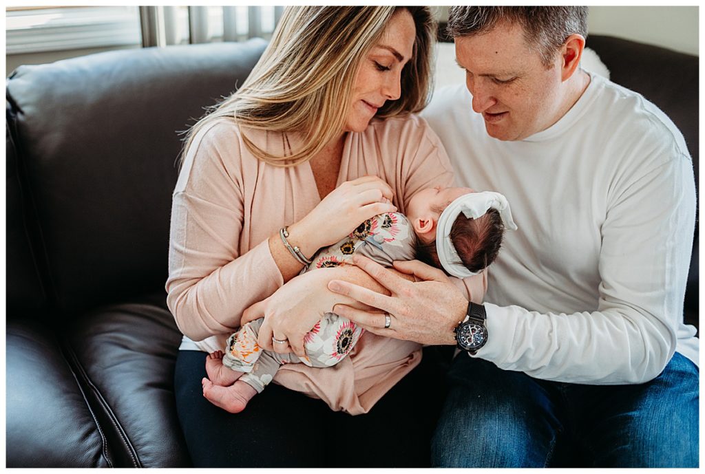 parents-holding-new-baby-girl-boston-newborn-photographer