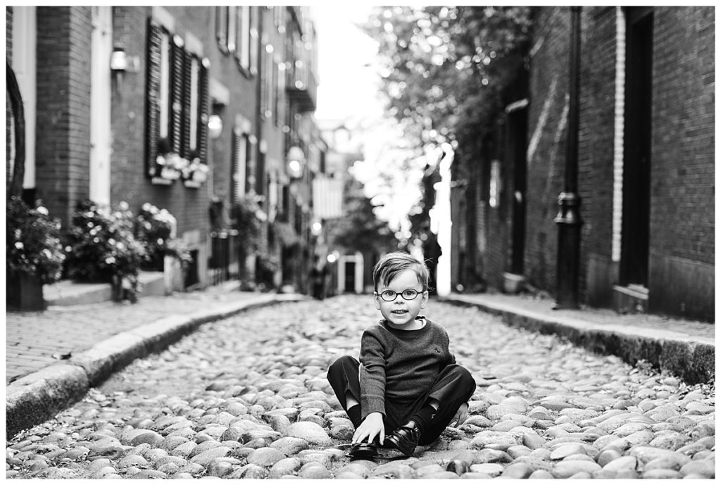 black-and-white-portrait-of-boy-on-acorn-street-boston-family-photographer