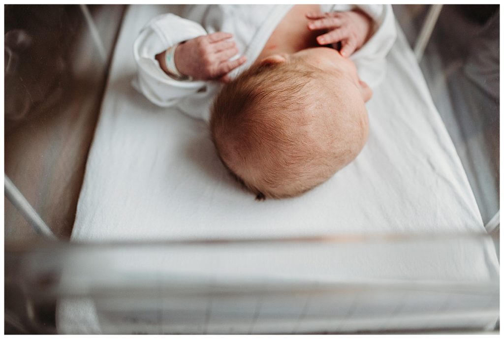 baby-laying-in-hospital-bassinet-boston-newborn-photographer