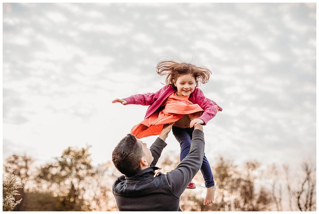 dad-throwing-daughter-in-air-boston-family-photographer