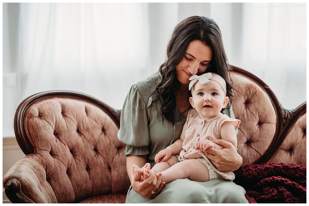 mother-and-daughter-on-pink-vintage-couch-boston-family-photographer