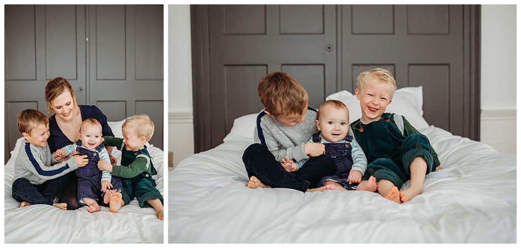 mother-and-three-sons-on-white-bed-boston-family-photographer