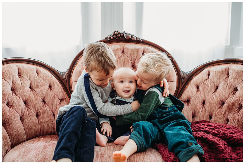 three-brothers-on-pink-couch-boston-family-photographer