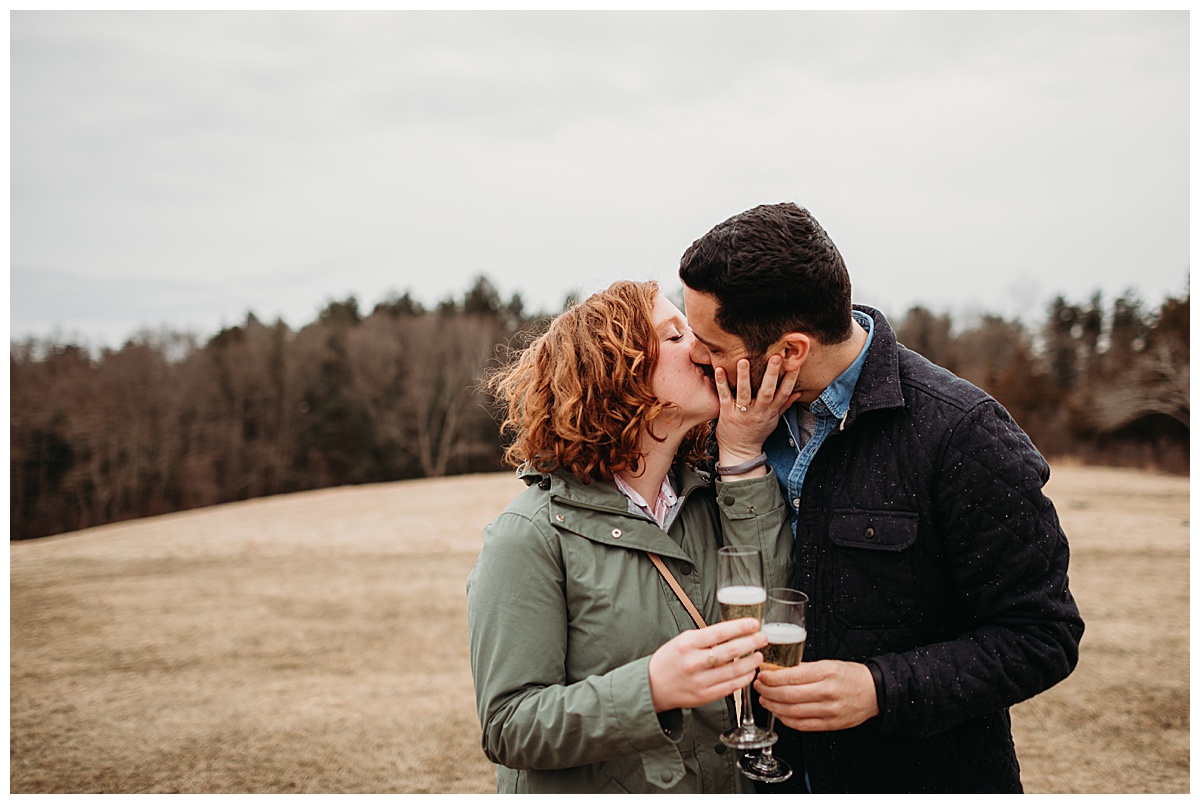 couple-kissing-on-hill-boston-wedding-photographer
