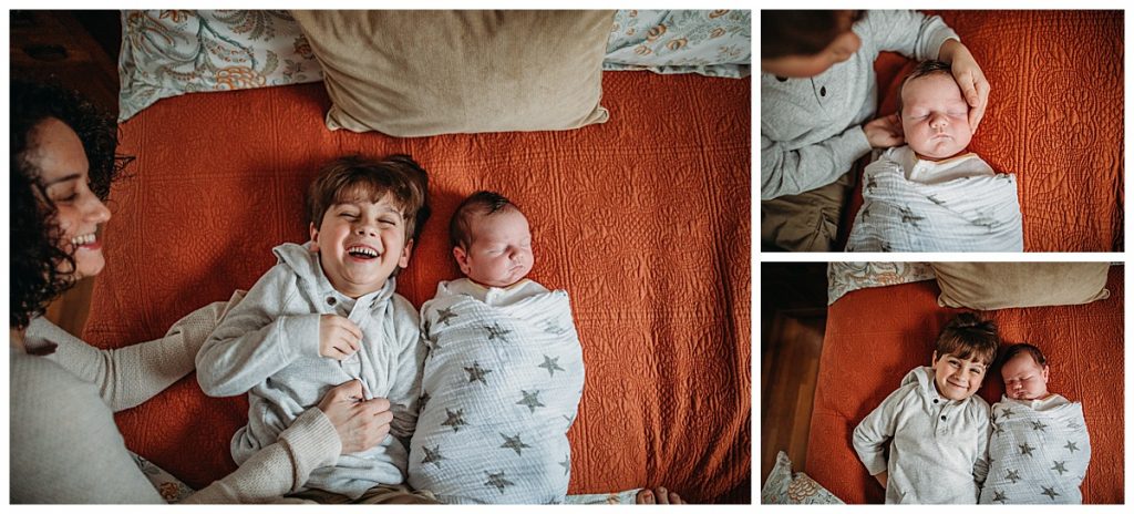 big brother holding little brother during newborn photo session