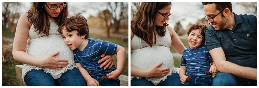 family snuggles baby brother in mamas belly during maternity photo shoot