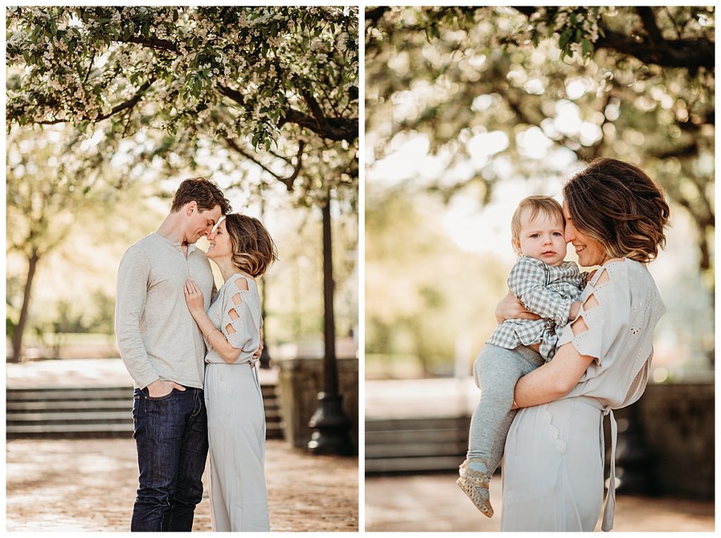 couple dressed in neutrals snuggling under a tree during photos