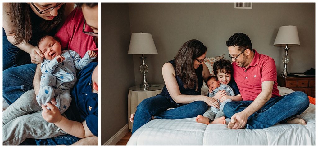 family on bed during newborn photo session in arlington