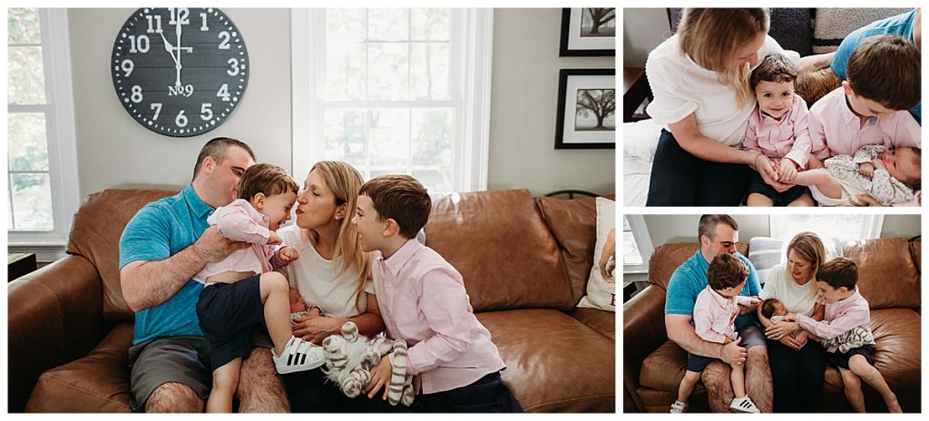 family of five sits on couch and snuggles during newborn photo session in framingham
