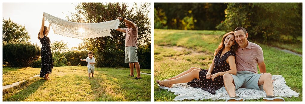 child runs under a lace blanket at sunset during family photo session