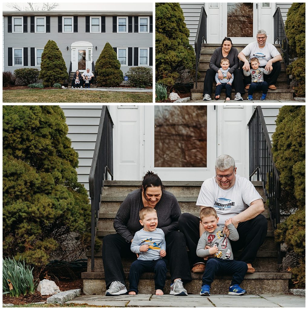 family with twin boys sits on front steps