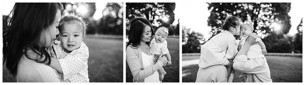 black and white portraits of a family with two little girls during photoshoot