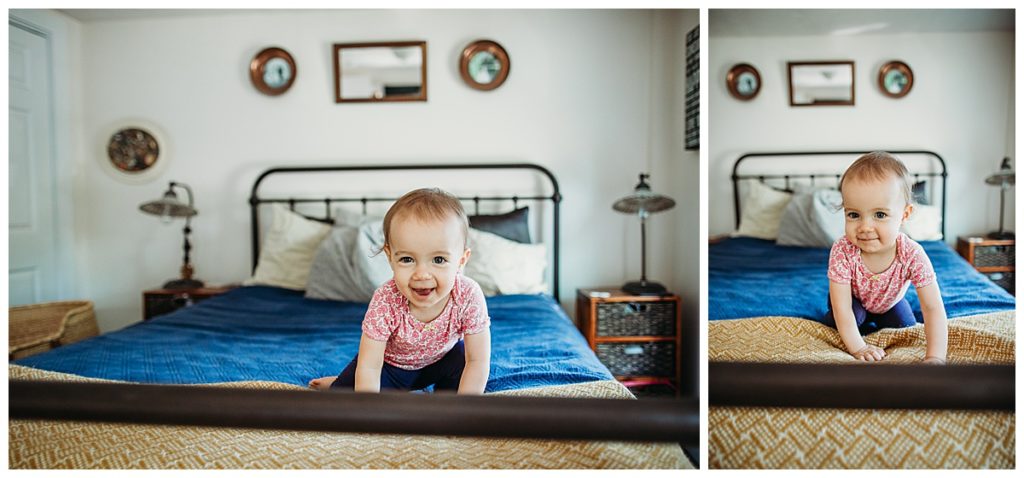 big sister plays on parents bed during newborn photo shoot