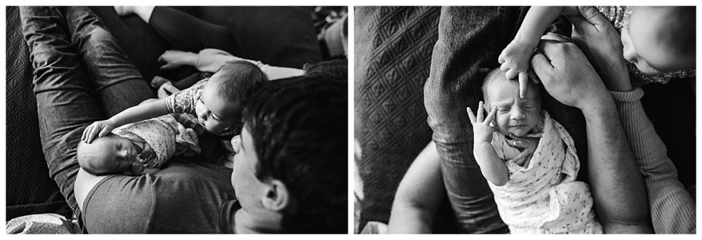 black and white portraits of father with daughters during newborn pictures