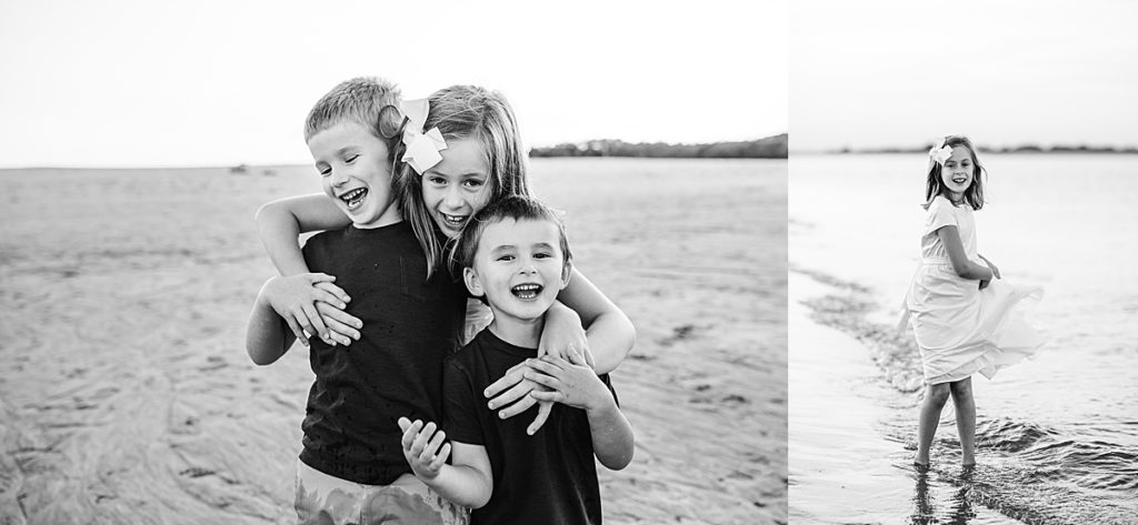 black and white sibling images on beach
