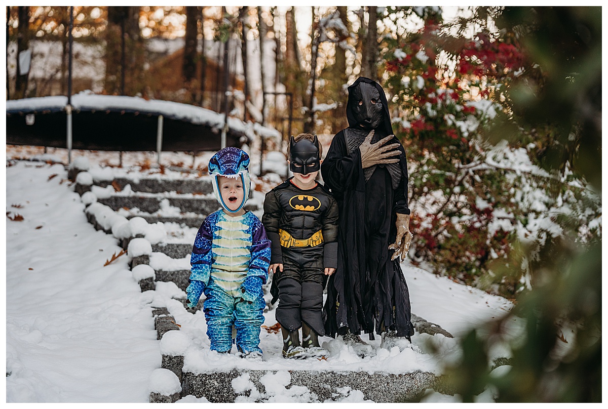 three boys dressed in costume for halloween