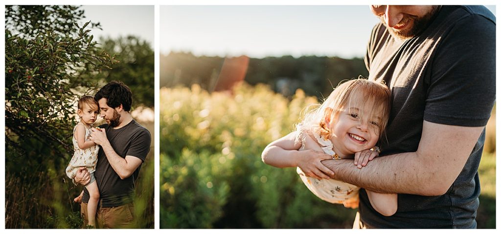 girl smiles at sunset with dad during photos
