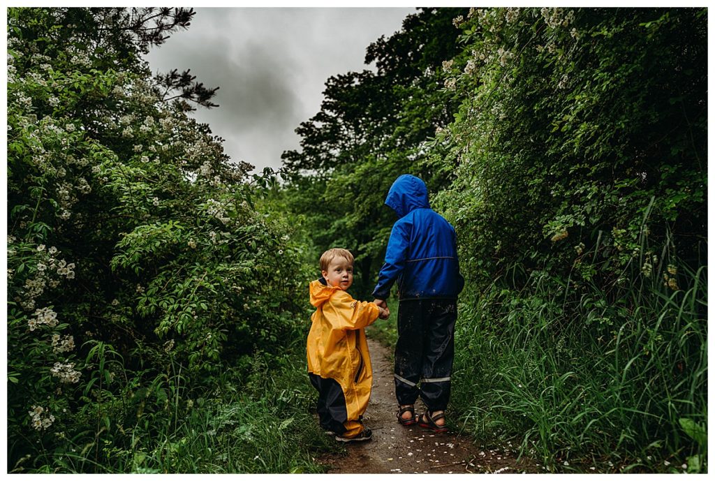 metro-west hikes for kids image if two boys in rainsuits