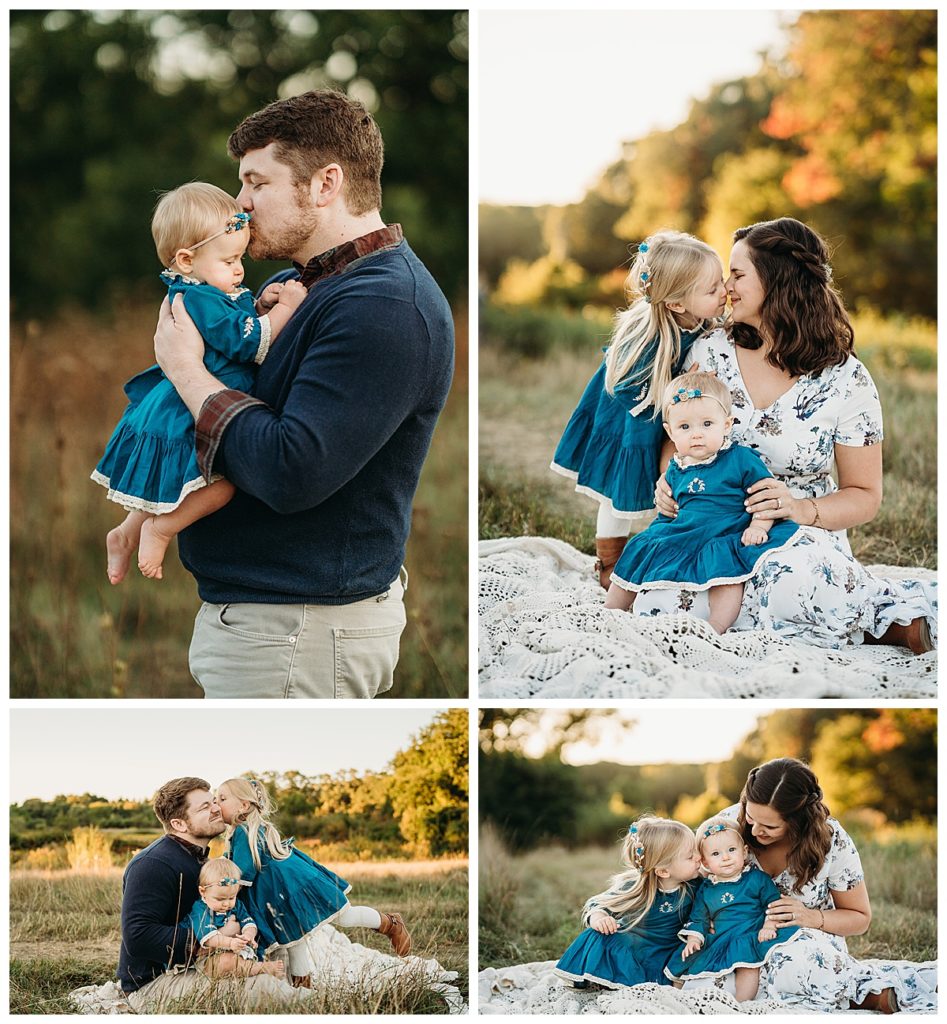 mom and dad kiss and snuggle daughters during outdoor family photos