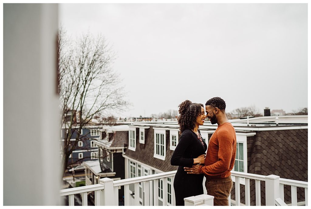 maternity image on rooftop deck in south boston