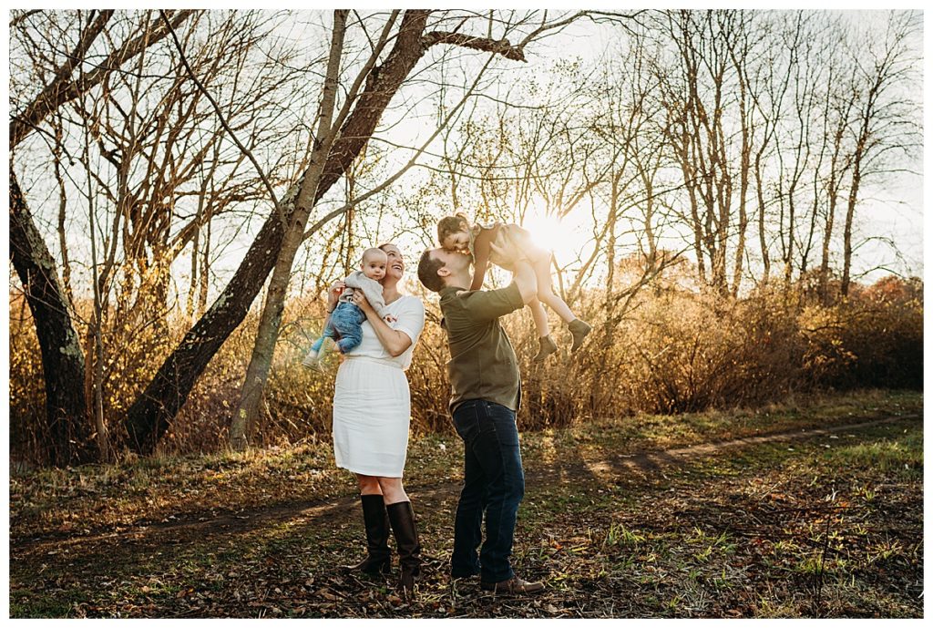 wide angle shot of family session at sunset in boston