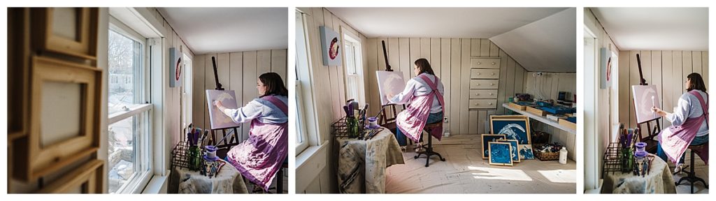 artist works in her home studio wearing purple apron