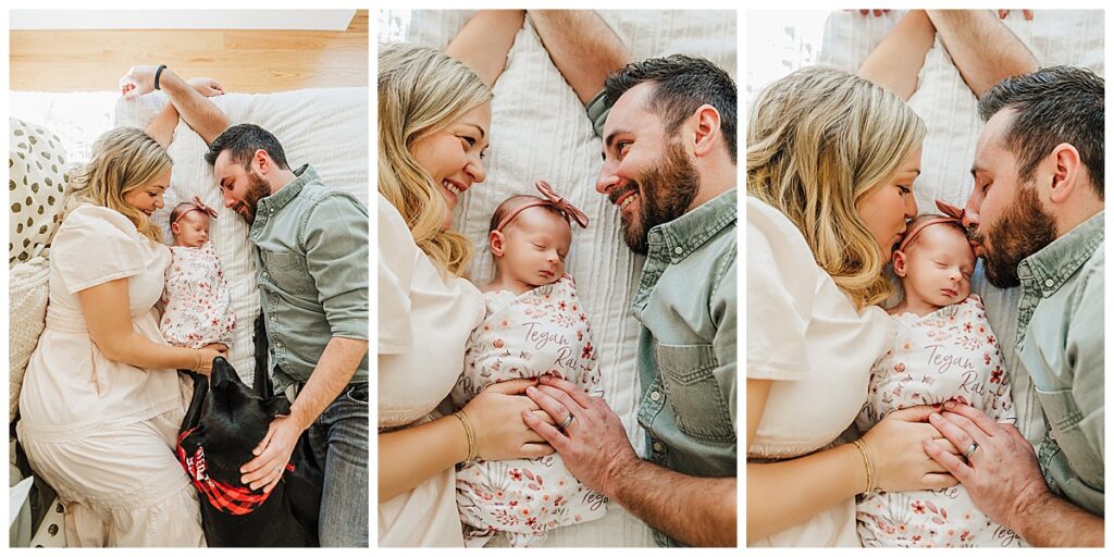 clients lay on bed with their newborn baby and dog during photoshoot