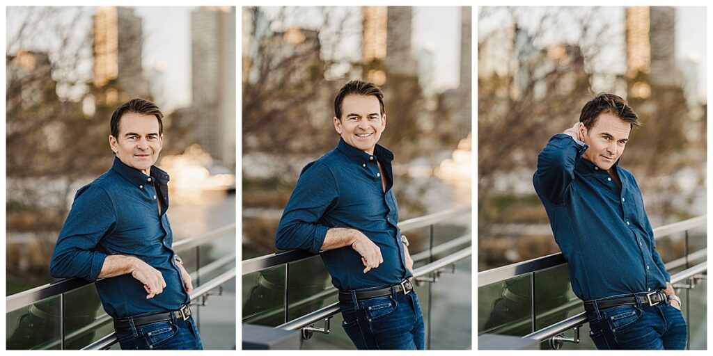 man leans against railing in boston seaport personal brand session.