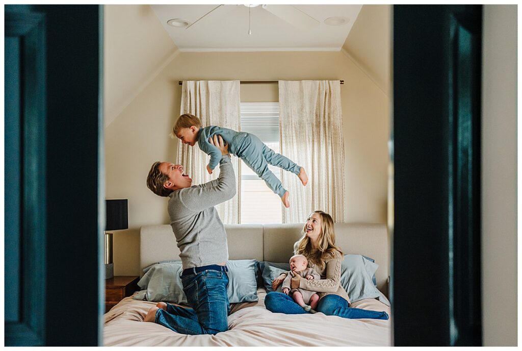 Detail shot of cozy textures and bare feet during in-home newborn photography session in Boston