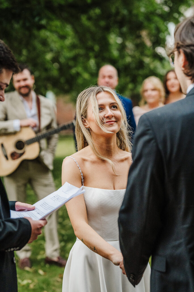 Close-up detail of vows during intimate outdoor elopement ceremony near Boston